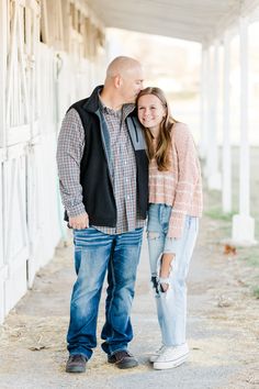 a man and woman standing next to each other