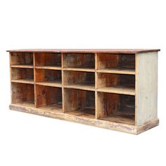 an old wooden shelf with many bins