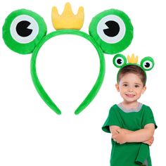 a young boy wearing a green frog ears costume