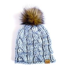 "Winter Hats > Pom Pom Hat > Winter Hat > Beanies For Women > Women Hats > Beanie Pom Pom > Winter Beanie > Beanie Hat Women > Beanie Hat the NIWOT merino wool cable knit beanie with faux fur pom pom > knit hat with faux fur pom pom > 100% merino wool > leather logo tag > one size fits most adults > hand knitted in Boulder, CO > dimensions: 8.5\" x 8.5\" > care: spot clean with cold water only, lay flat to dry more luxury wool beanies https://www.etsy Beanie Pom Pom, Beanies For Women, Cable Knit Beanie, Women Beanie, Hats Beanie, Stocking Hat, Women Hats, Baby Hats Knitting, Boulder Co