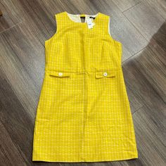 Nwt Brooks Brothers Dress. Fully Lined. Flaps In Front Do Not Have Pockets. Yellow Lined Fitted Midi Dress, Yellow Fitted Lined Midi Dress, Yellow Fitted Midi Dress With Lining, Yellow Fitted Midi Dress, Lined, Yellow Lined Midi Dress, Yellow Shift Midi Dress For Spring, Chic Yellow Shift Dress, Chic Yellow Lined Midi Dress, Chic Yellow Cotton Dress