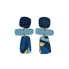 These stunning earrings are handmade and one of a kind. Each piece features beautiful blue hues, lightweight design, quirky shapes and gold leaf accents. The different textures and materials give each piece its own character, making it truly a unique piece of jewellery.  The perfect accessory for any outfit, the Constance Earrings are sure to add a touch of elegance and fun. Elevate your outfit today with Constance.  These earrings measure approximately 5cms long. Polymer clay will flex a bit but can break if dropped or bent too much. Please handle it with care when removing the items from the package, when putting them in and taking them out, and when storing them. To clean, gently rub them with a damp cloth and dry them carefully. Avoid spraying perfume on them and wearing these earrings Blue And Gold Earrings, Spraying Perfume, Stocking Fillers For Him, Homemade Earrings, Character Making, Stocking Fillers For Her, Forever Jewelry, Pin Jewelry, Todays Outfit