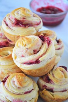 several small pastries on a white plate