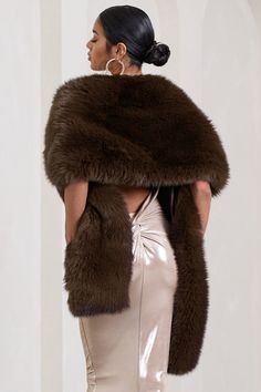 What better way to accessorise this party season than with a versatile piece like Softly? Looped at one end to create an easy and opulent neck-wrap, this faux fur scarf elevates any outfit you decide to pair with it. For a black tie look, try pairing Softly with our Rosie metallic dress. Features- Premium faux fur- Loop pull-through detail- Multi-styling purposeSizing & fit Model is 5'8.5 and wears UK one sizeProduct informationDesigned exclusively by Club L LondonFully lined with no stretchPremium faux fur in Brown (100% Polyester)SKU: CL129540022 Fur Shawl Dress, Fur Scarf With Dress, Fur Scarf Outfit, Lace Mermaid Dress, Faux Fur Scarf, Fur Dress, Dress Code Wedding, Faux Fur Scarves, Fabric Scarf