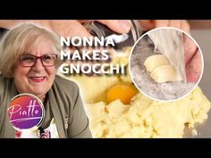 an older woman is making food in the kitchen with her hands and eggs on top