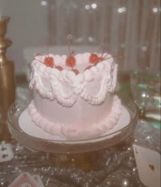 a white cake sitting on top of a table