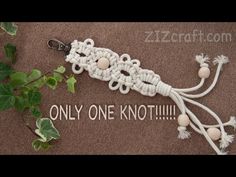 a key chain with beads and tassels attached to it that says, only one knot