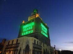 the emerald island casino is lit up at night