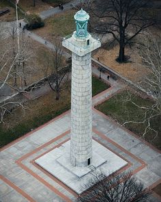 an aerial view of a monument in the middle of a park