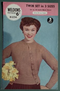 a magazine cover with a woman in a cardigan sweater and flowers on the front