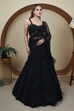 Black lehenga skirt saree with an attached cancan and ruffle details. Comes with a hand embroidered drape and sequin, cutdana, crystals embroidered padded corset. - Aza Fashions Black Lehenga Skirt, Saree With Corset, Ruffle Lehenga, Skirt Saree, Ruffle Dupatta, Lehenga Skirt, Stylish Party, Stylish Party Dresses