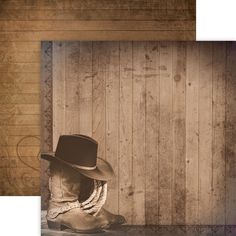 a cowboy hat sitting on top of a pair of boots next to a wooden wall