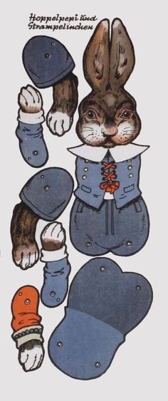 a paper cut out of a cat wearing blue overalls and hat with other items surrounding it