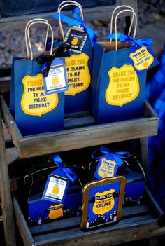 blue and yellow bags with tags on them