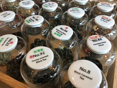 there are many glass jars with labels on them that say no 8 and no 2