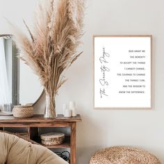 a room with a chair, mirror and vase on the wall next to a plant