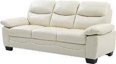 a white leather couch sitting on top of a hard wood floor