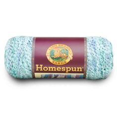 lion brand yarns homespun yarn in light blue and green, with the words lion