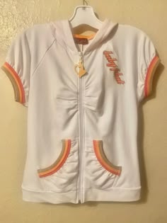 Vintage Baby Phat , Y2K, short sleeve hoodie, neural/orange strip, emblem zipper pull, two side pockets, emblem on shoulder back, cotton/stretch spandex type material, good preowned condition, sold as is. Measurements Appropriately: Size Medium/small Baby Phat 2000s Aesthetic, Baby Phat 2000s, 2000 Clothes, Thrift Wishlist, Outfits 2000s, Street Fits, Fashion Gal, Pullover Outfit, Y2k Hoodie