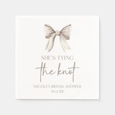 she's tying the knot napkins are white with brown bows on it and grey lettering