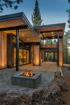 a fire pit in the middle of a patio