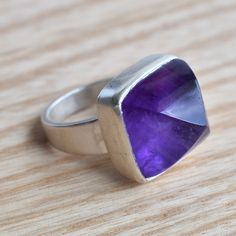 Elegant Pomellato Nudo Ring, Natural Amethyst Sugarloaf Ring, 925 Sterling Silver Ring For Women, Handmade Sterling Silver Ring, Pompom Ring Stone - Amethyst  Stone Size - 16mm Stone Shape -  Sugarloaf Materiel - 925 Sterling Silver Note - For any kind of customization and question kindly contact us via Etsy Convo.  Delivery - It takes 10 to 15 business days to be delivered. We ship to all over the world.  Making - We have our own manufacturing. Every piece we make is checked and processed by ou Sugarloaf Ring, Classic Amethyst Signet Ring Hallmarked, Classic Hallmarked Amethyst Signet Ring, Hand-strung Silver Amethyst Jewelry, Silver Luxury Amethyst Ring With Polished Finish, Sterling Silver Cabochon Amethyst Ring Gift, Silver Ring For Women, Handmade Sterling Silver Rings, Ring Stone