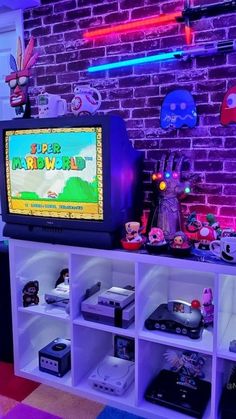 Super Mario World Retro Gaming Aesthetic Game Room / Office Ideas, Retro Video Game Room Ideas, Arcade Office Design, Tiny Game Room Ideas, Gamer Home Decor, Arcade Aesthetic Room, Small Arcade Room Ideas, Video Game Wall Decor, Kallax Game Room