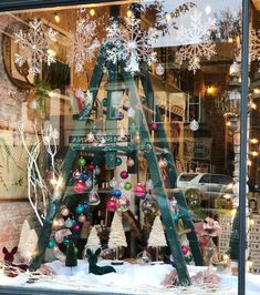 a window display with christmas decorations in it