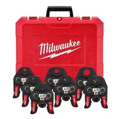 six milwaukee tools in a red case