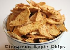 cinnamon apple chips in a bowl on a white surface with the words cinnamon apple chips above it