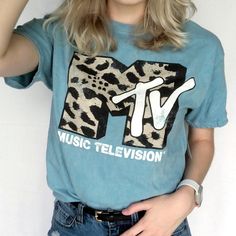 Vintage Style Distressed Leopard Print Mtv Tee. Cropped Measurements Pit To Pit: 17.5” Length: 18” Raw Edge Hem New With Tag. 100% Cotton. Never Worn. Bundle For Great Offers! Blue Distressed Graphic Tee, Blue Distressed Grunge Tops, Trendy Distressed Blue T-shirt, Trendy Blue Distressed T-shirt, Trendy Blue Distressed Top, Distressed Graphic Tee, Mtv Logo, White Top Women, Black Graphic Tees