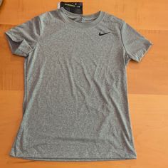 Brand New Nike Heather Gray Athletic Top. Women’s Small. Dri-Fit Technology. Standard Fit. Practice Shirts, Nike Winter Jackets, Nike Quarter Zip, Gray Nike, Nike Shirt, Nike Workout, White Long Sleeve Shirt, Athletic Top