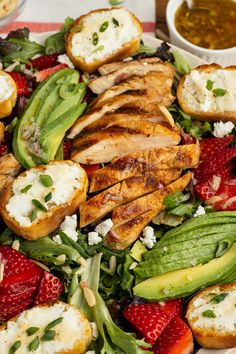 a close up of a plate of food with meat and vegetables