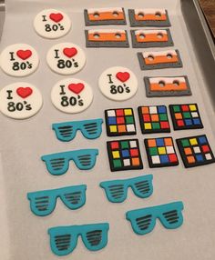 the cookies are decorated like sunglasses and i love 80's