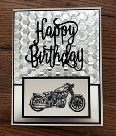 a birthday card with a motorcycle on the front and black writing that says happy birthday