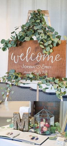 a wooden welcome sign sitting on top of a table next to pictures and other items