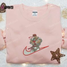 Ryu x Swoosh Embroidered Hoodie & Street Fighter Shirt: Best Family Gift Ideas Rapunzel Cartoon, Nike Cartoon, Nike Inspired, Best Family Gifts, Maroon Hoodie, Obito Uchiha, Embroidered Shirts, Tyler Durden, Anime Sweatshirt