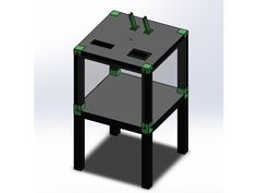 a black table with green tape around the top and bottom edge, on a white background