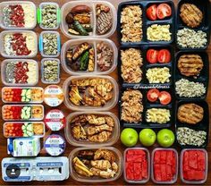 several plastic containers filled with food on top of a wooden table