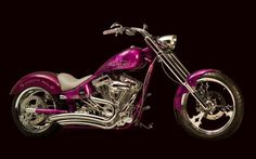 a purple motorcycle parked on top of a black background