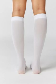 Classic Sheer Knee High Sock | Urban Outfitters Fitted Solid Color Knee-high Socks, Knee-high Stockings, Solid Stretch Knee-high Socks, Solid Color Stretch Knee-high Socks, Fitted Mid-calf Stockings, Fitted White Mid-calf Socks, Soft Knee-high Socks For Stocking Stuffers, Classic Fitted Knee-high Socks, White Fitted Knee-high Socks