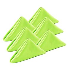 four lime green napkins sitting on top of each other