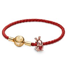 From Pandora, celebrate the year of your birth and new beginnings with the Chinese Year of The Rabbit Charm and Red Woven Leather Bracelet Set. This 14k rose gold-plated 3D rabbit holds a heart-shaped red man-made crystal and shines a bright light into the new year that embodies peace, elegance and a dash of luck. Wear this set to mark your special occasion or gift it to someone born under the rabbit sign. Rabbit Sign, 3d Rabbit, Rabbit Charm, Wedding Day Jewelry, Chinese Year, Year Of The Rabbit, Engagement Ring Guide, The Rabbit, Bright Light