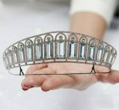 This tiara is beautifully silver-plated and encrusted with sparkling clear genuine zirconium stones of various sizes and Aquamarine. The many zirconium And Aquamarine Stones make this crown sparkle in any light. This piece is versatile and compliments many different styles, can be worn for Weddings, Bridal Showers, Birthdays, Baby Showers, Graduation, Maternity Shoots or any special occasions! Handmade Bridal Tiaras/Crown Made to Order Diamond Weight -- 8.54ct Diamond -- American Diamonds/Zircon Handmade Tiaras, Royal Tiaras, Diamond Tiara, Crown Tiara, Diamond Crown, Diamond Brooch, Royal Jewels, Aquamarine Stone, Diamond Star