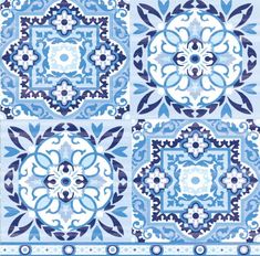 four blue and white tiles with floral designs on the sides, all in different colors