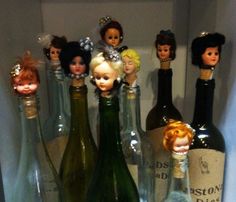 there are many bottles that have dolls in them