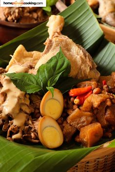 a close up of a plate of food with meat and veggies on it