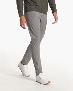 A formal design with an ultra-comfortable fit and feel, the Aim Pants have lightweight stretch, plenty of pockets and all-day durability. Great for golfing, traveling and everyday work to life to play. | Vuori Aim Pants | Concrete | 36 Vuori makes premium performance apparel inspired by the active Coastal California lifestyle; an integration of fitness, surf, sport, and art. Breaking down the boundaries of traditional activewear, we are a new perspective on performance apparel. Versatile 4-way Stretch Dress Pants For Business Casual, Golf Bottoms With Pockets And 4-way Stretch, Versatile Tapered Leg Dress Pants With 4-way Stretch, Versatile 4-way Stretch Tapered Leg Dress Pants, Casual Stretch Golf Pants, Casual Stretch Pants For Golf, Straight Leg 4-way Stretch Bottoms For Golf, Casual Tapered Leg Golf Pants, 4-way Stretch Tapered Leg Golf Pants