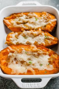 baked sweet potatoes with meat and cheese in a casserole dish