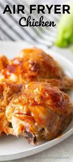 an air fryer chicken on a white plate